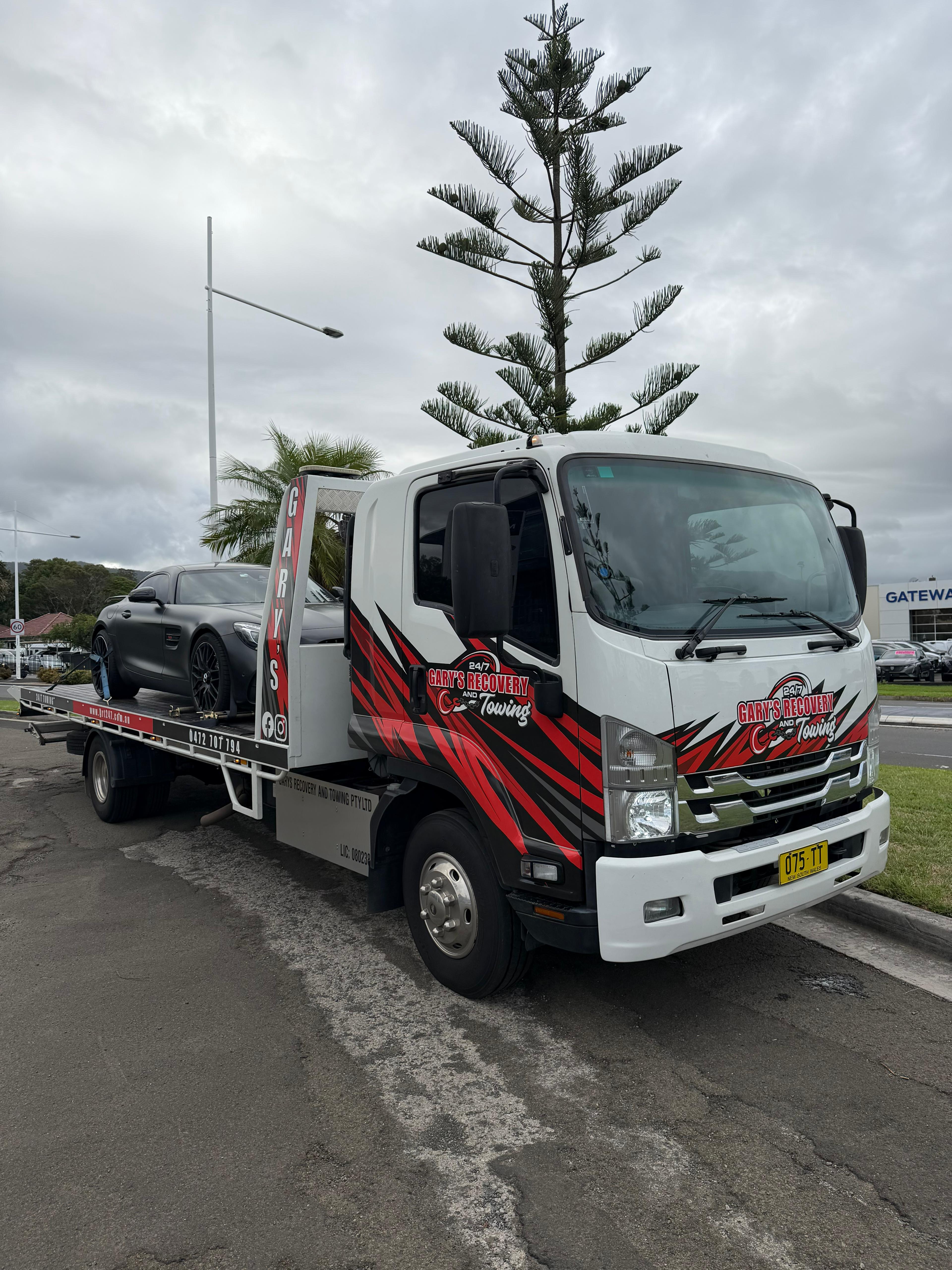 Gary's Recovery & Towing flatbed truck